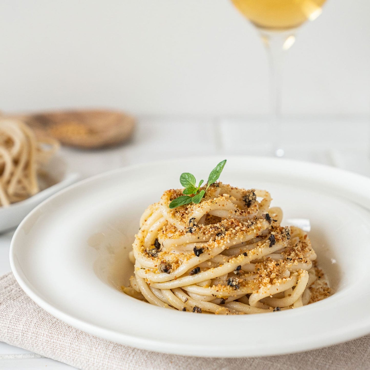 Pici pasta with truffles breadcrumbs and anchovies 